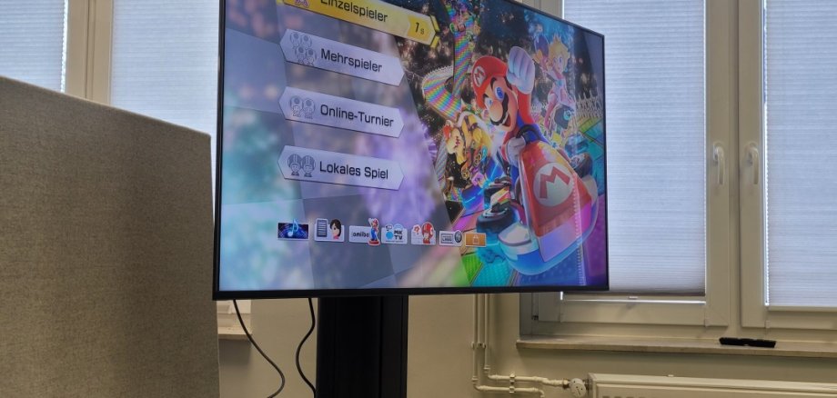 Das Spiel Mario-Kart auf einem Bildschirm
