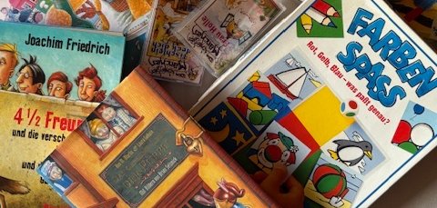 Zu sehen sind mehrere bunte Kinderbücher