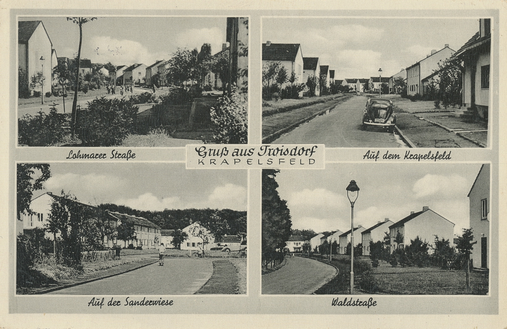 Die Straße Auf dem Krapelsfeld (heute: Güldenbergstraße) auf einer historischen Ansichtskarte, Verlag F. Vogel in Oberlar (Quelle: Stadtarchiv Troisdorf) Die Straße Auf dem Krapelsfeld (heute: Güldenbergstraße) auf einer historischen Ansichtskarte, Verlag F. Vogel in Oberlar (Quelle: Stadtarchiv Troisdorf)